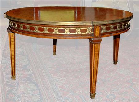 Lot image - Louis XVI Style Gilt-Metal Mounted Parquetry Inlaid Walnut, Satinwood and Mahogany Low Table