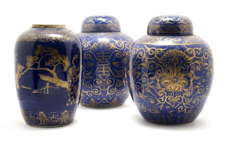 Lot image - Pair of Chinese Gilt Decorated Glazed Porcelain Covered Vases