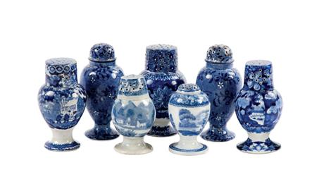 Lot image - Group of Seven Staffordshire Blue and White Pottery Casters