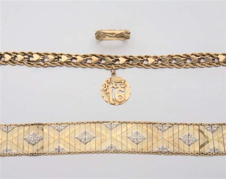 Lot image - Group of Gold and Metal Rings and Bracelets