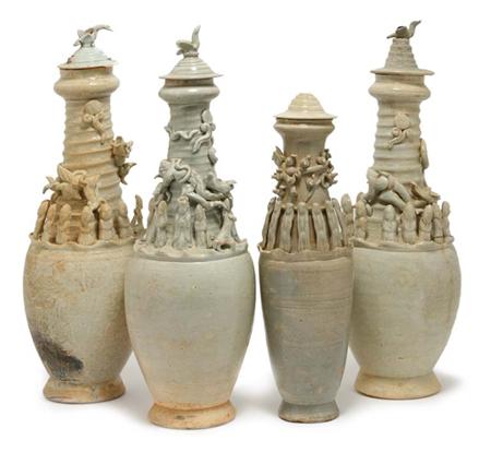 Lot image - Group of Four Chinese Celadon Glazed Pottery Burial Urns