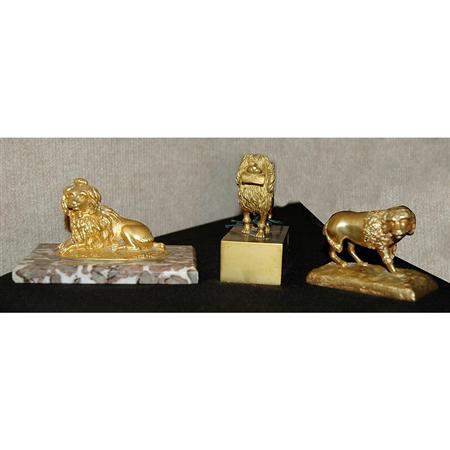 Lot image - Group of Six Gilt-Metal Dogs