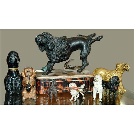 Lot image - Group of Eight Metal Miniature Figures of Dogs