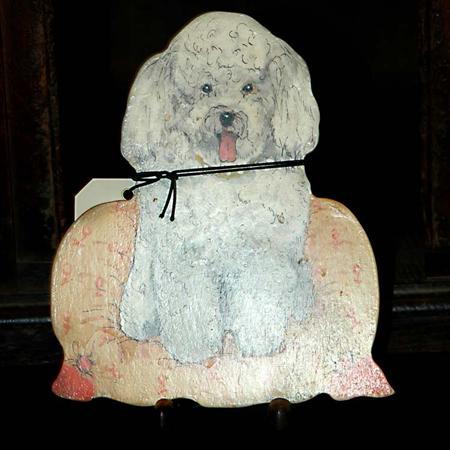 Lot image - Two Pictures of Dogs; Together with Two Hand-Painted Dog Table Decorations