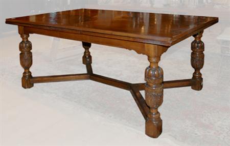 Lot image - Renaissance Style Carved Mahogany Draw Leaf Dining Table
