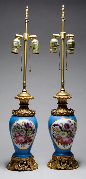 Lot image - Pair of Sevres Style Gilt-Metal Mounted and Gilt Decorated Porcelain Two-Light Lamps
