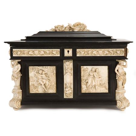Lot image - Continental Carved Ivory and Ebonized Casket