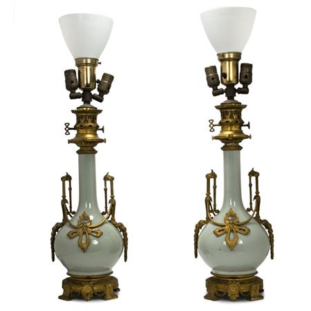 Lot image - Pair of Louis XVI Style Gilt-Metal Mounted Glazed Porcelain Three-Light Lamps