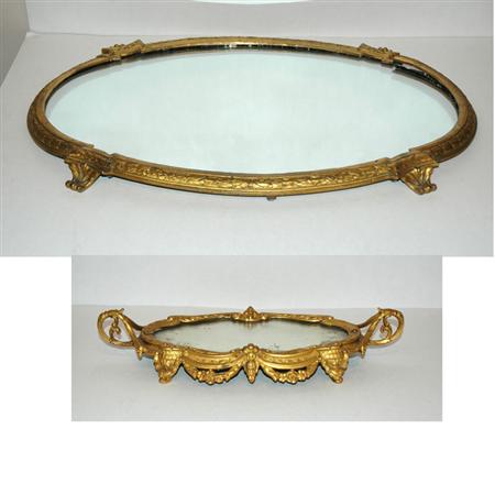 Lot image - Louis XVI Style Gilt-Bronze Mirrored Plateau