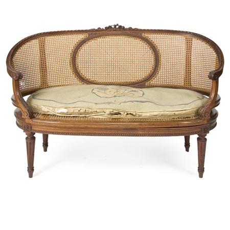 Lot image - Louis XVI Style Caned Mahogany Settee