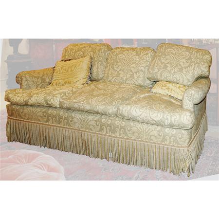 Lot image - Taupe and Tan Upholstered Three-Seat Sofa