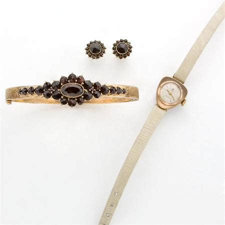 Lot image - Group of Garnet Jewelry, Metal Jewelry and One Wristwatch