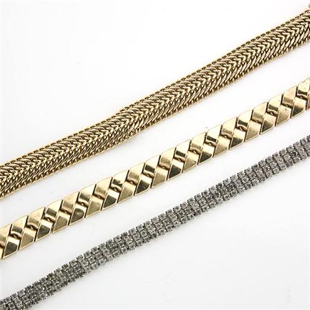 Lot image - Assorted Group of Gold and Metal Jewelry