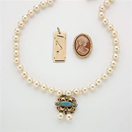 Lot image - Assorted Group of Gold and Metal Jewelry