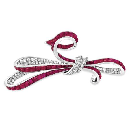 Lot image - Cabochon Ruby and Diamond Bow Brooch, Trabert & Hoeffer, Mauboussin