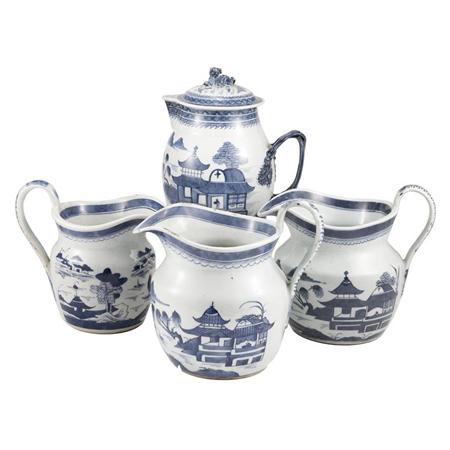 Lot image - Chinese Export Porcelain Blue and White Covered Jug; Together with Three Canton Blue and White Porcelain Jugs