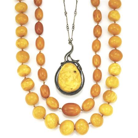 Lot image - Three Amber Bead Necklaces and Reconstructed Amber Pendant with Chain