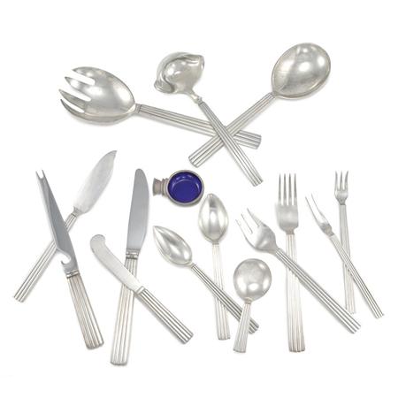 Lot image - Georg Jensen Sterling Silver Flatware Service; Together with Four Georg Jensen Sterling Silver Salt and Pepper Shakers