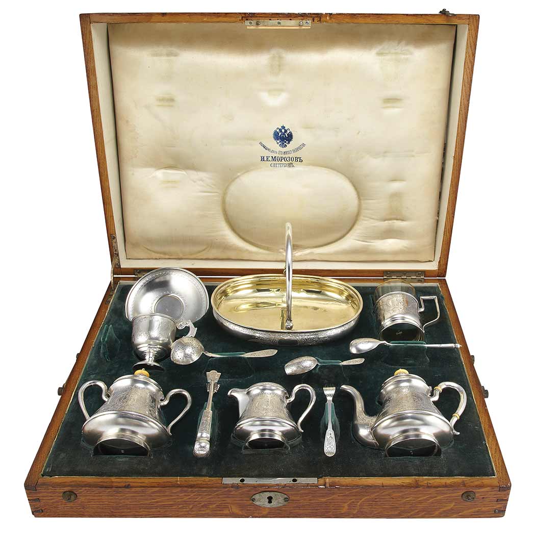 Lot image - Russian Silver Tea Service; Together with an Associated Group of Russian Silver Flatware Articles