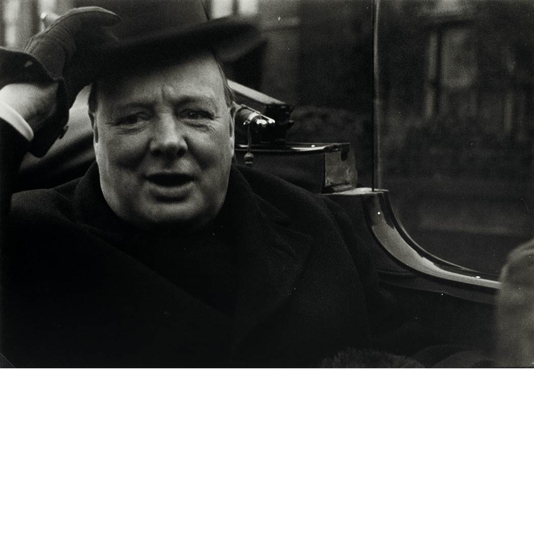 Lot image - [CHURCHILL, WINSTON S.] AIGNER, LUCIEN (1901-1999). Winston Churchill, 1934 Gelatin silver print, flush mounted 7 5/8 x 9 3/...