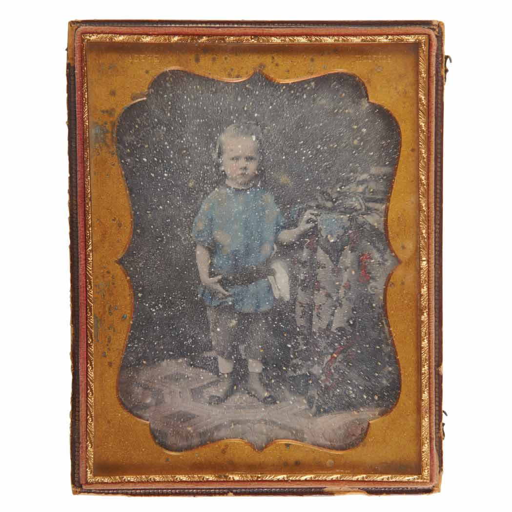Lot image - [EARLY PHOTOGRAPHY] Group of four images. Comprising a cased half-plate daguerreotype with hand coloring depicting a standin...