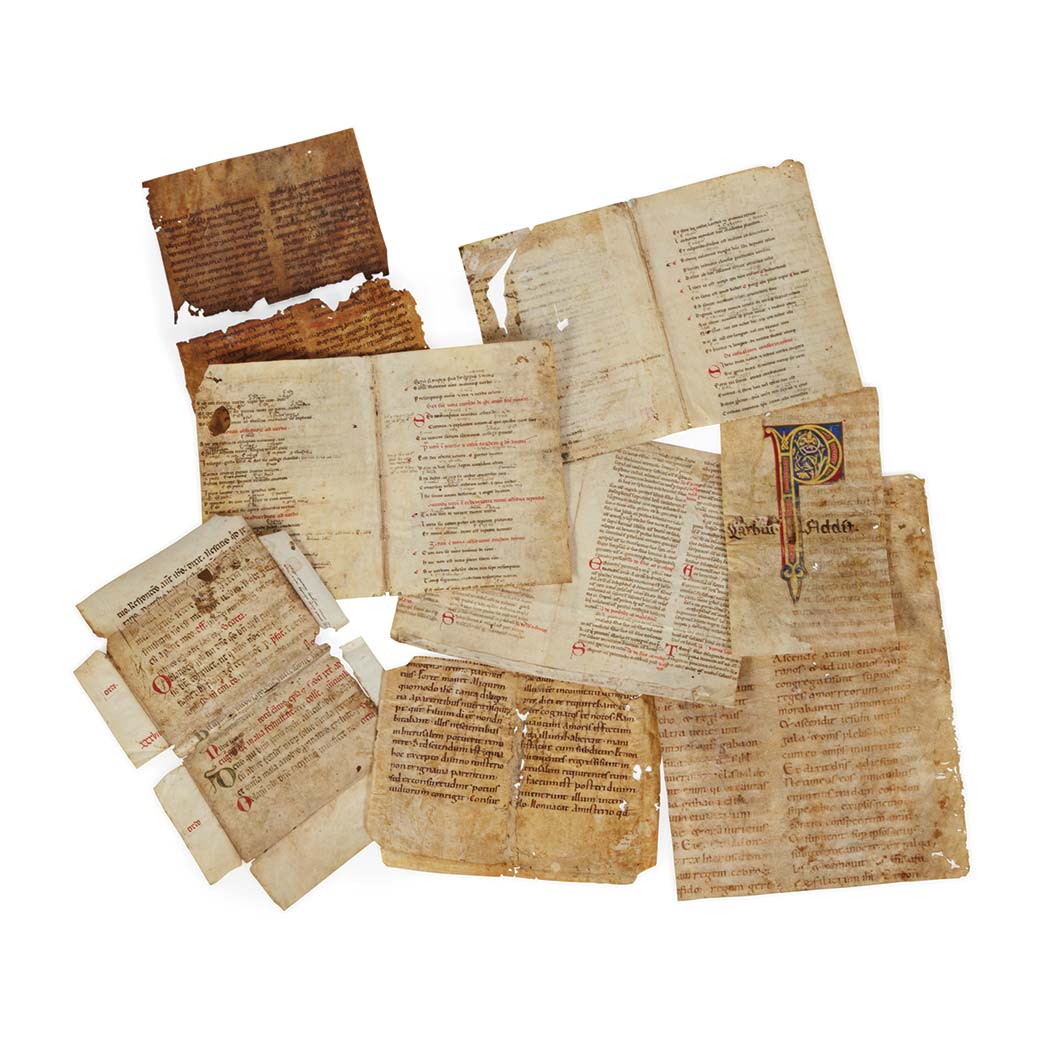 Lot image - [MANUSCRIPT]  Collection of leaves and fragments from decorated manuscripts, in Latin, written on vellum