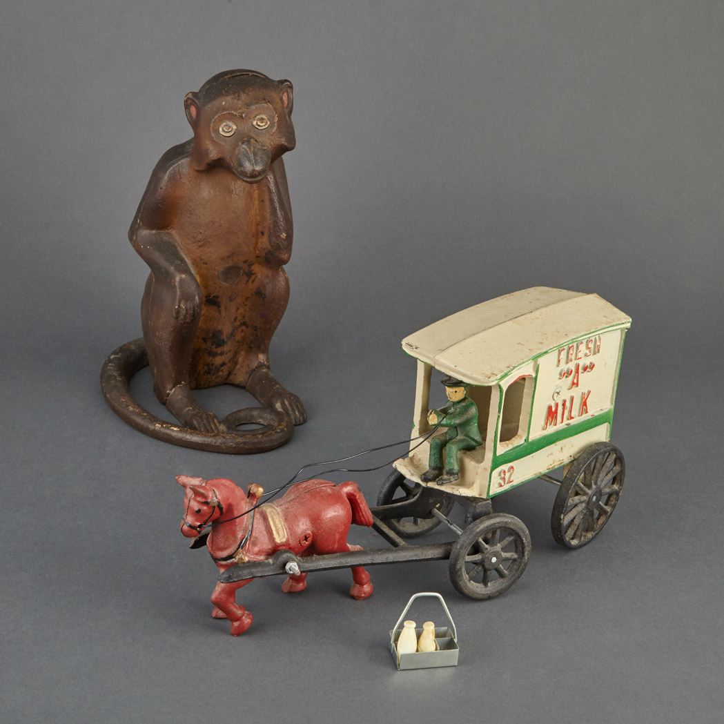 Lot image - Monkey Still Bank and Milk Cart