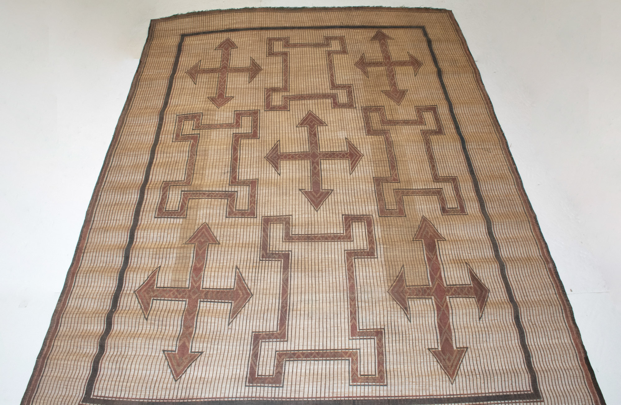 Lot image - Tuareg Woven Reed and Leather Carpet