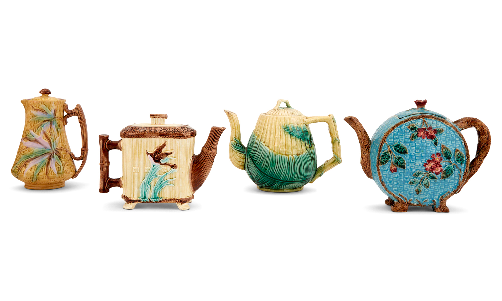 Lot image - Group of Three English Majolica Teapots and a Pitcher with Cover