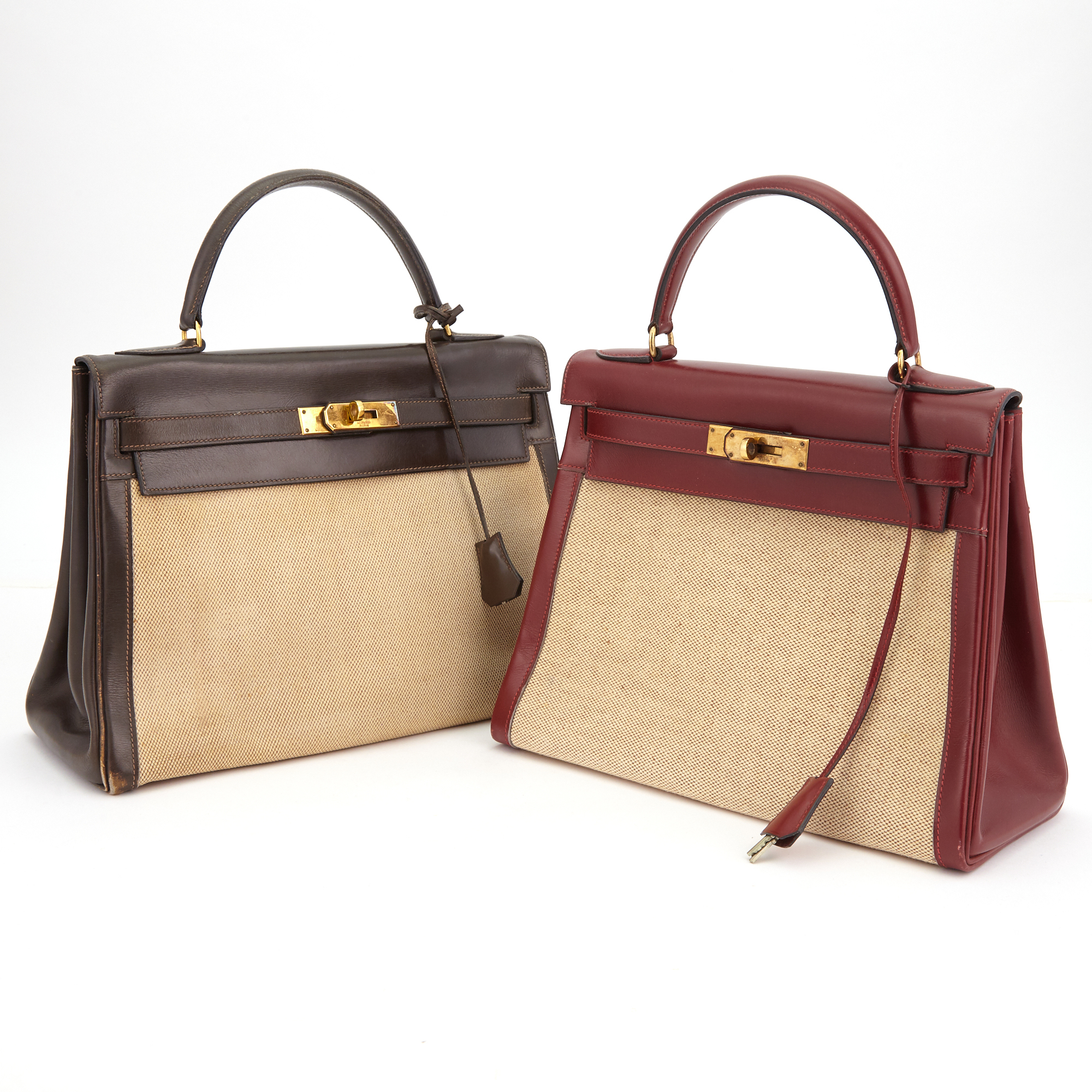 Lot image - Hermés Burgandy Calfskin and Canvas Kelly 28 Handbag and Hermés Chocolate Calfskin and Canvas Kelly 32 Handbag