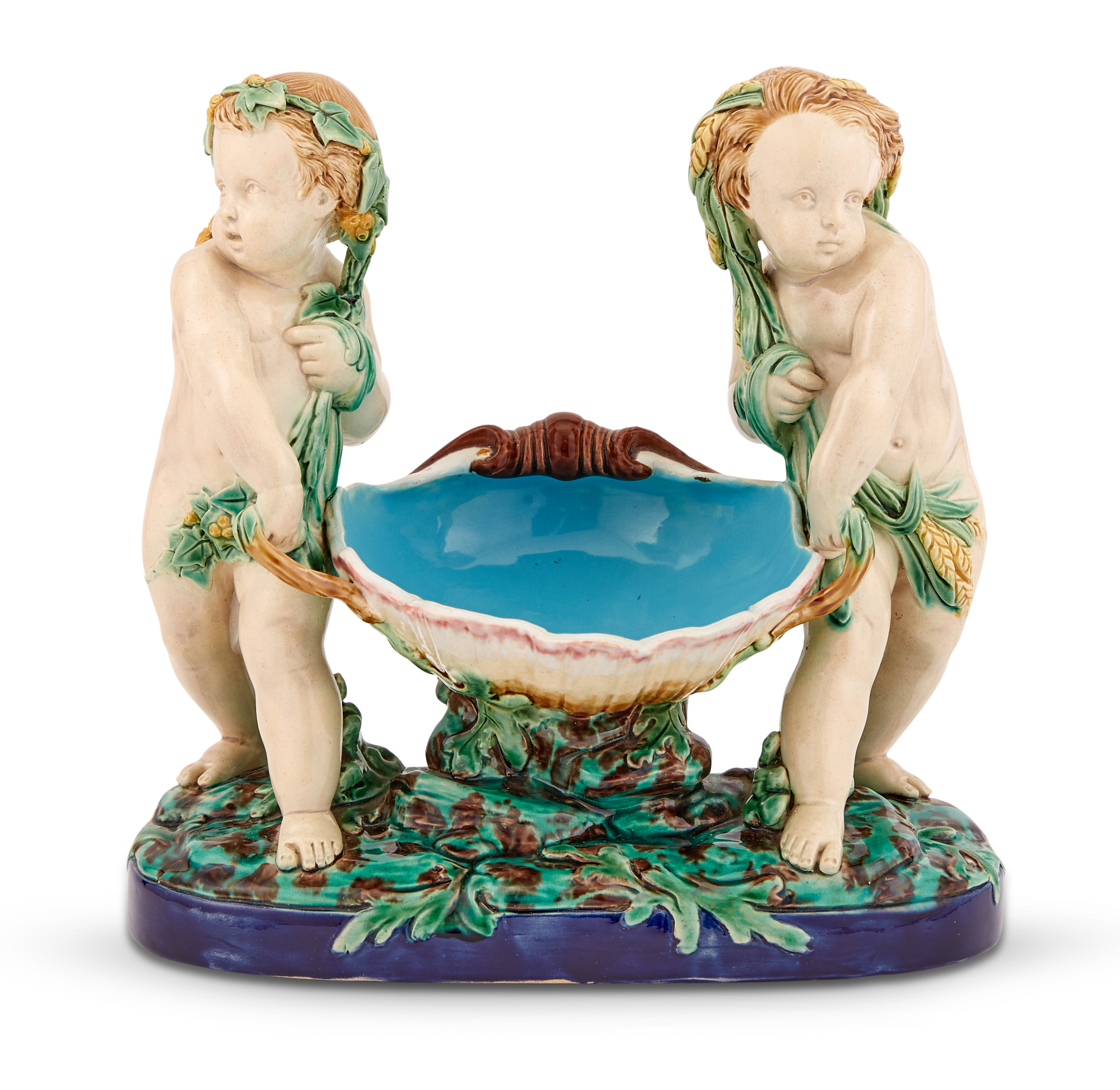 Lot image - Minton & Co. Majolica Figural Sweetmeat Dish With Putti and Shell-Shaped Bowl Emblematic of Spring and Summer