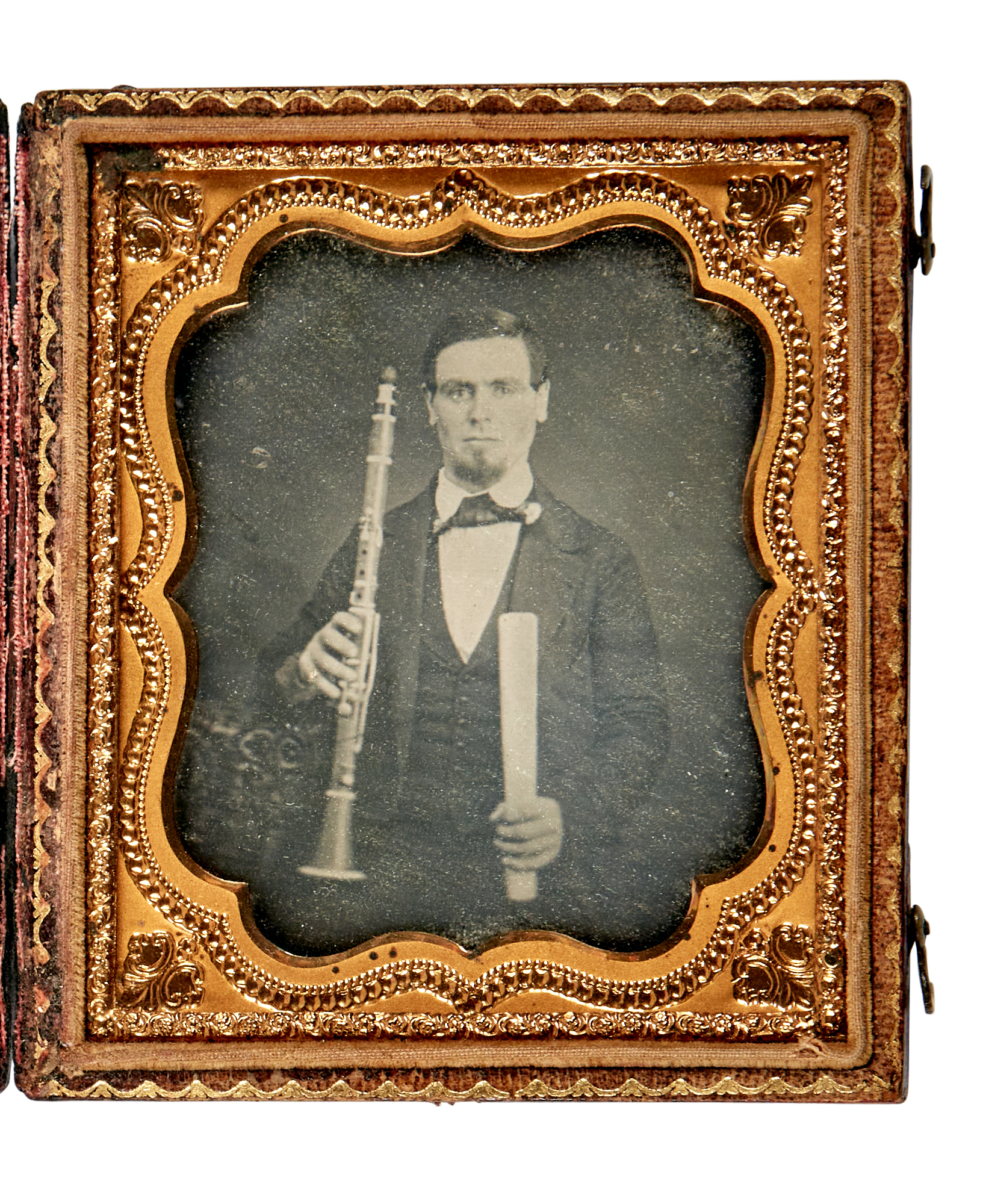 Lot image - [DAGUERREOTYPE-MUSICIANS]  Daguerreotype of a clarinetist.
