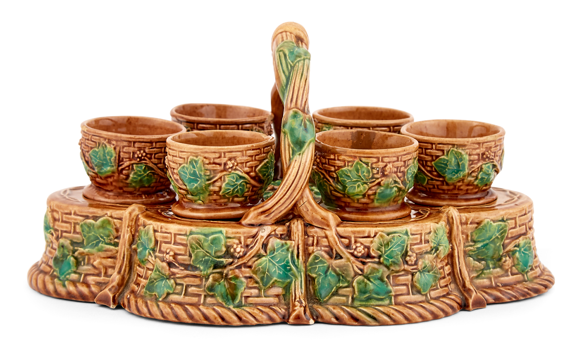Lot image - Majolica Basket-Form Egg Cup Stand and Six Egg Cups