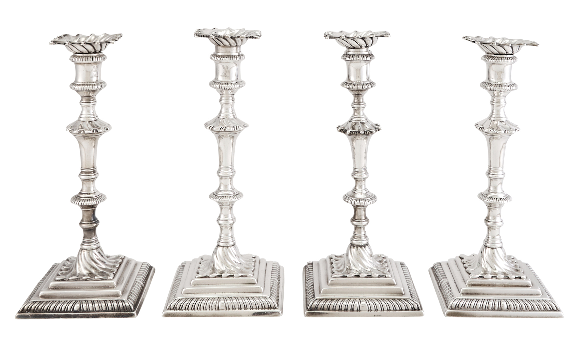 Lot image - Matched Set of Four George III Sterling Silver Candlesticks