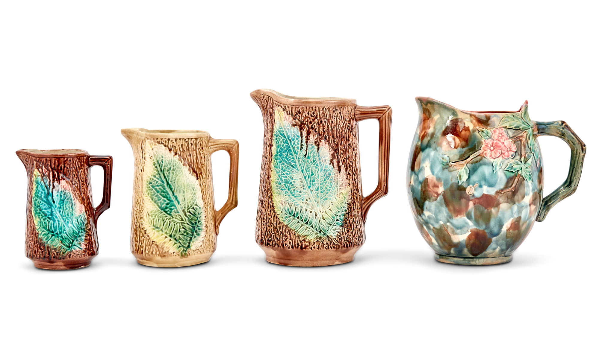 Lot image - Group of Four English Majolica Jugs