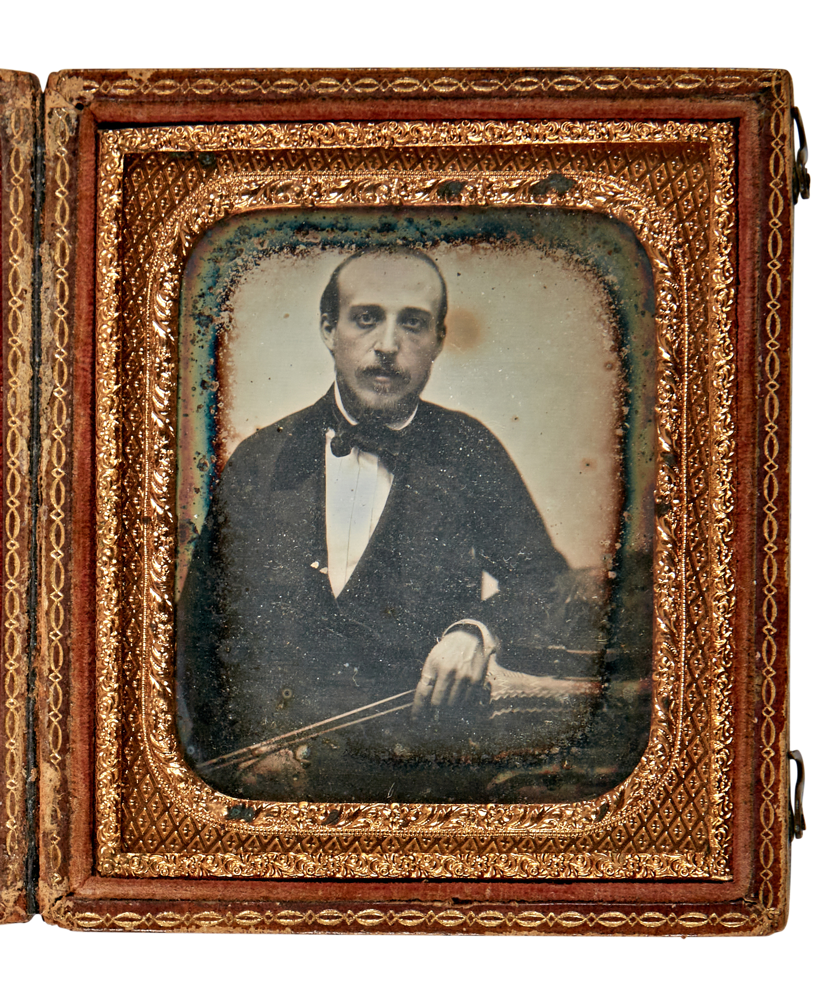 Lot image - [DAGUERREOTYPE-MUSICIANS]  Daguerreotype of a violinist holding a bow.