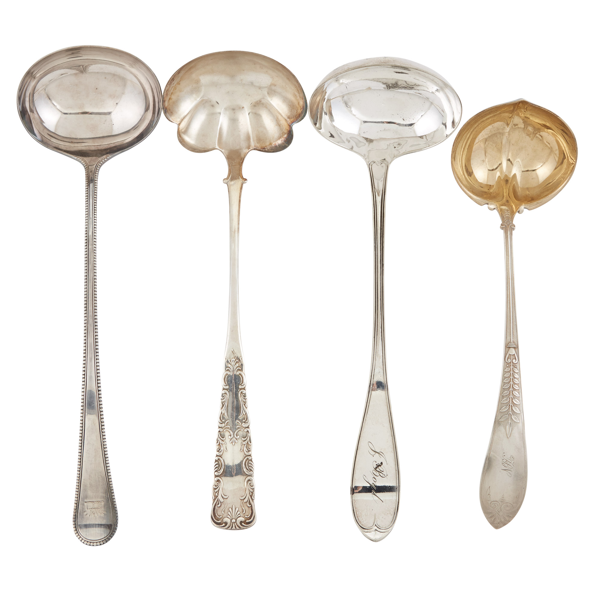 Lot image - Group of Seven Silver Plated Serving Utensils; Together with a Gorham Sterling Silver Soup Ladle