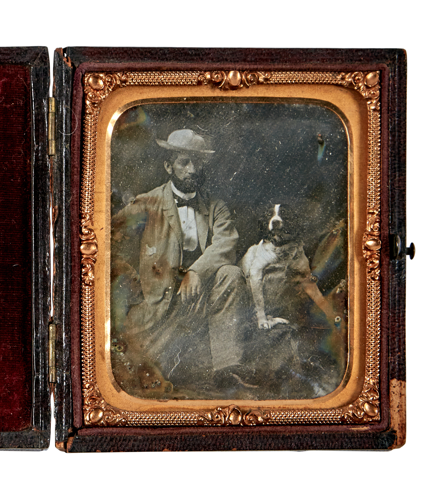 Lot image - [DAGUERREOTYPE-ANIMAL]  Daguerreotype of a man and his dog, possibly a terrier.