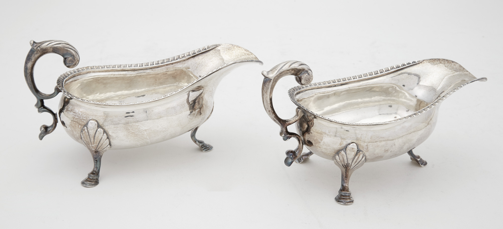 Lot image - Pair of William IV Sterling Silver Sauceboats
