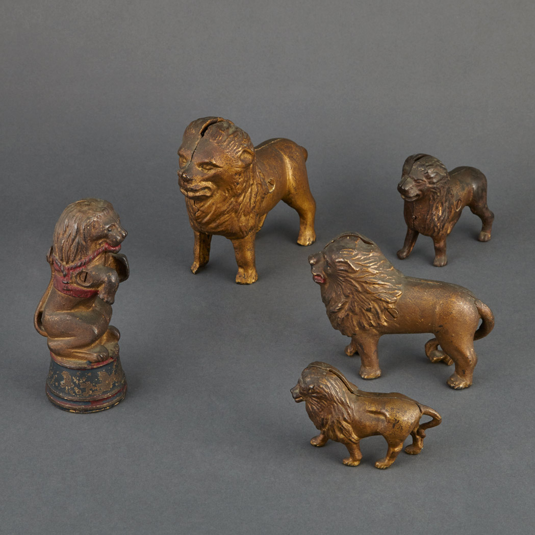 Lot image - Group of Five Standing Lion Still Banks