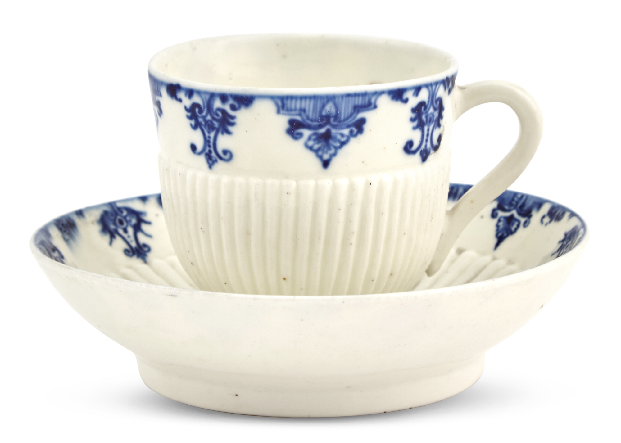 Lot image - Saint Cloud Porcelain Blue and White Cup and Socketed Saucer (Tasse Trembleuse et Soucoupe)