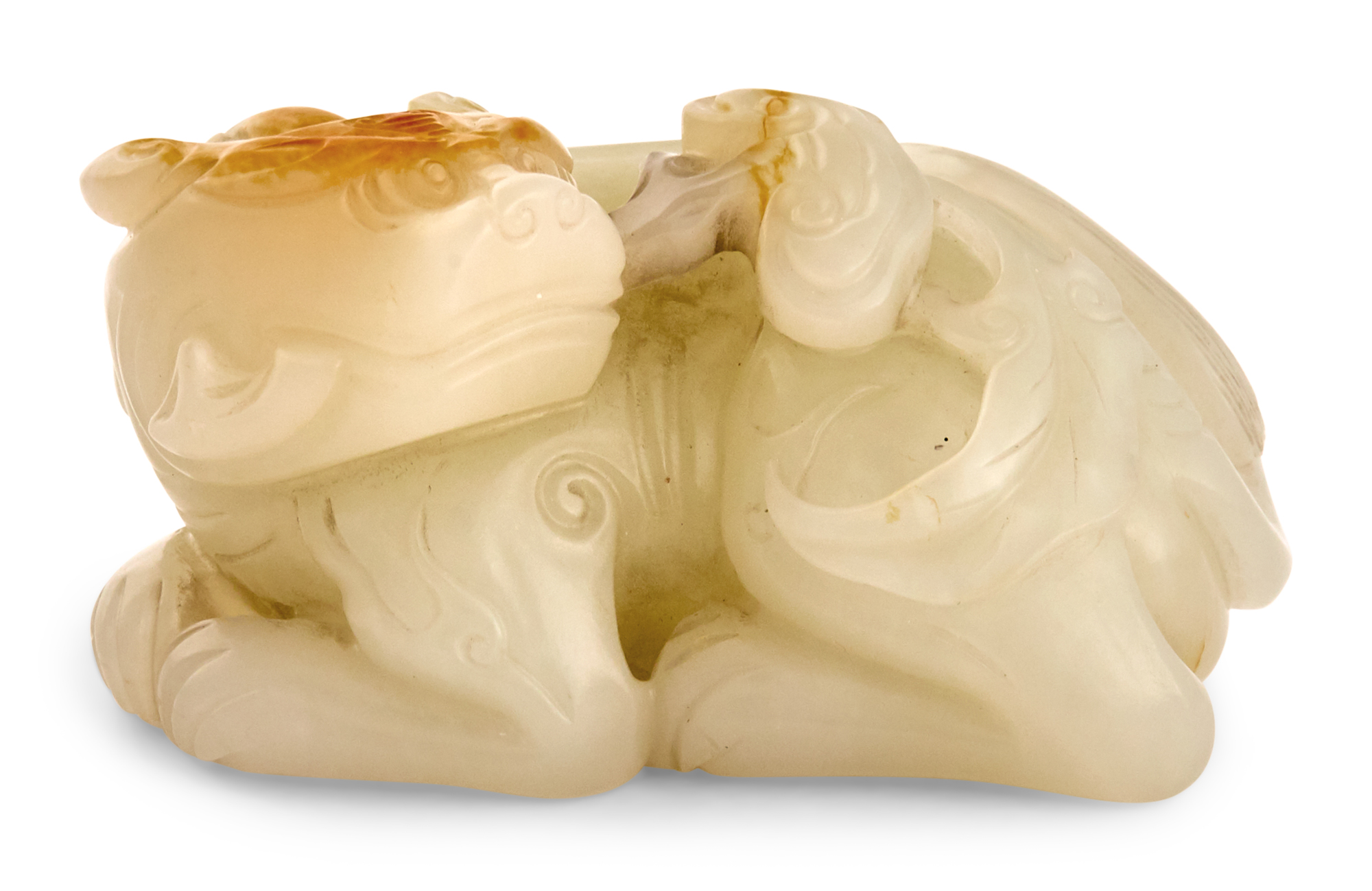 Lot image - A Chinese Carved White Jade Beast