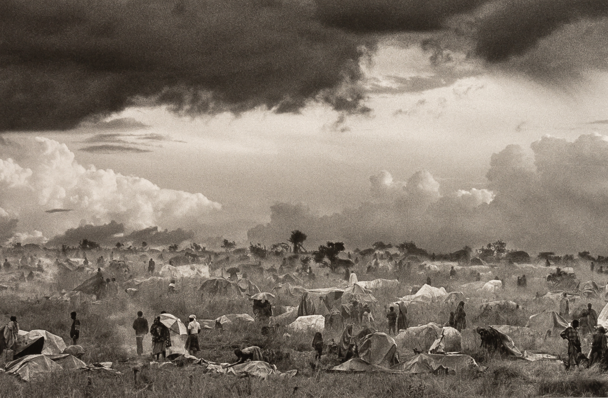 Lot image - SALGADO, SEBASTIÃO  The first day of installation of the camp of Benako for the Rwandan Tutsi and Hutu Refugees, Tanzania,
