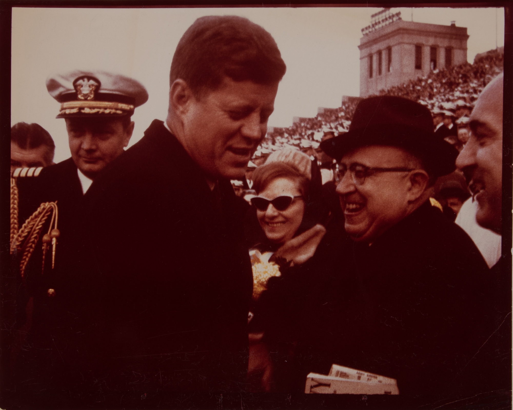 Lot image - KENNEDY, JOHN F.  Group of snapshots and one larger print depicting John F. Kennedy at the Army vs. Navy football game at Philadelphia, December, 1961.