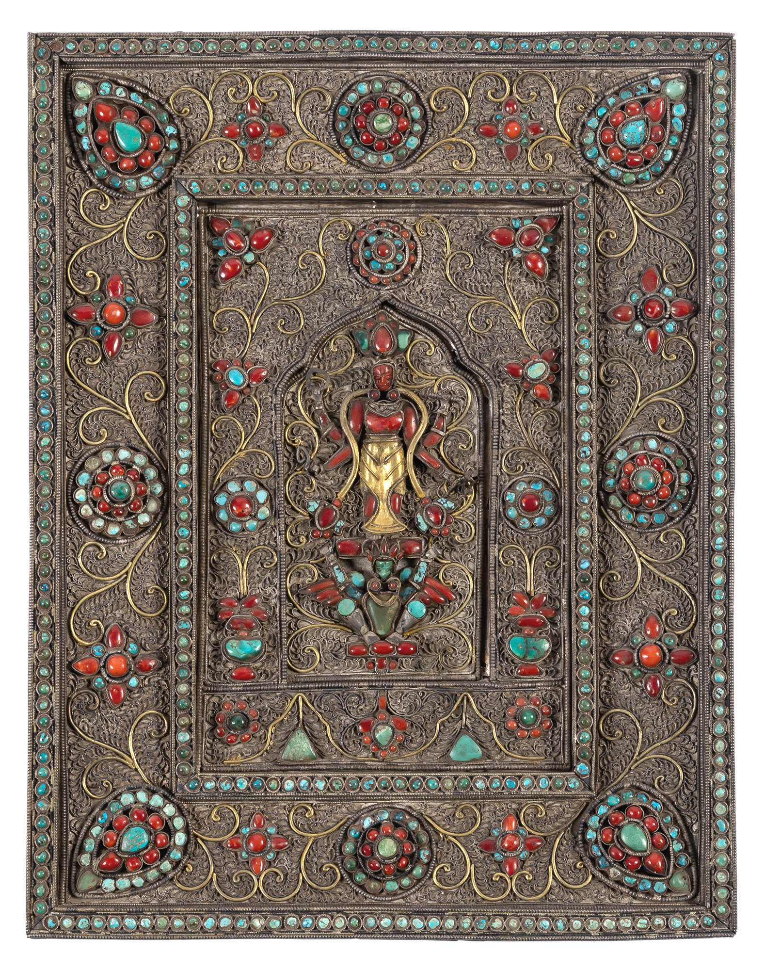 Lot image - A Nepalese Hardstone-Embellished White Metal Icon