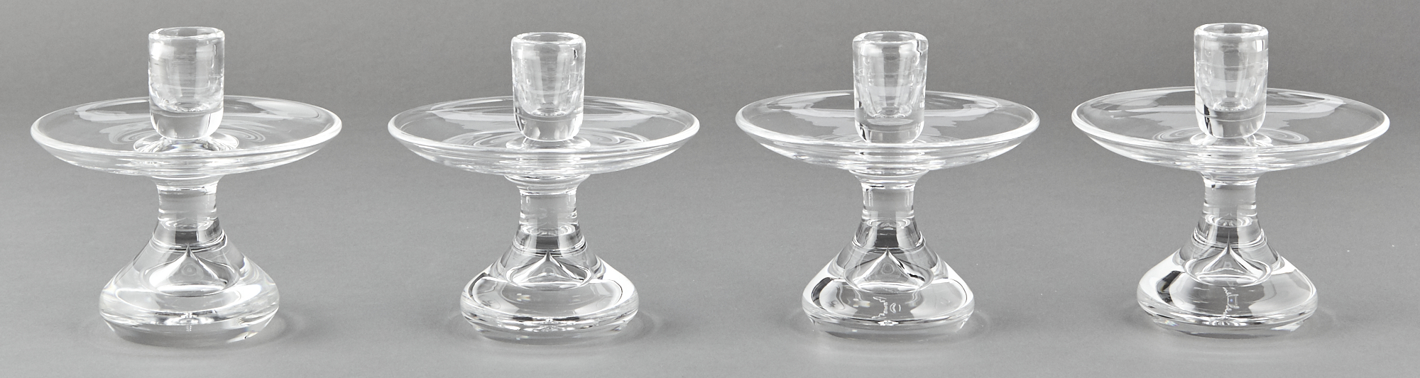 Lot image - Set of Four Steuben Glass Flared Teardrop Candlesticks