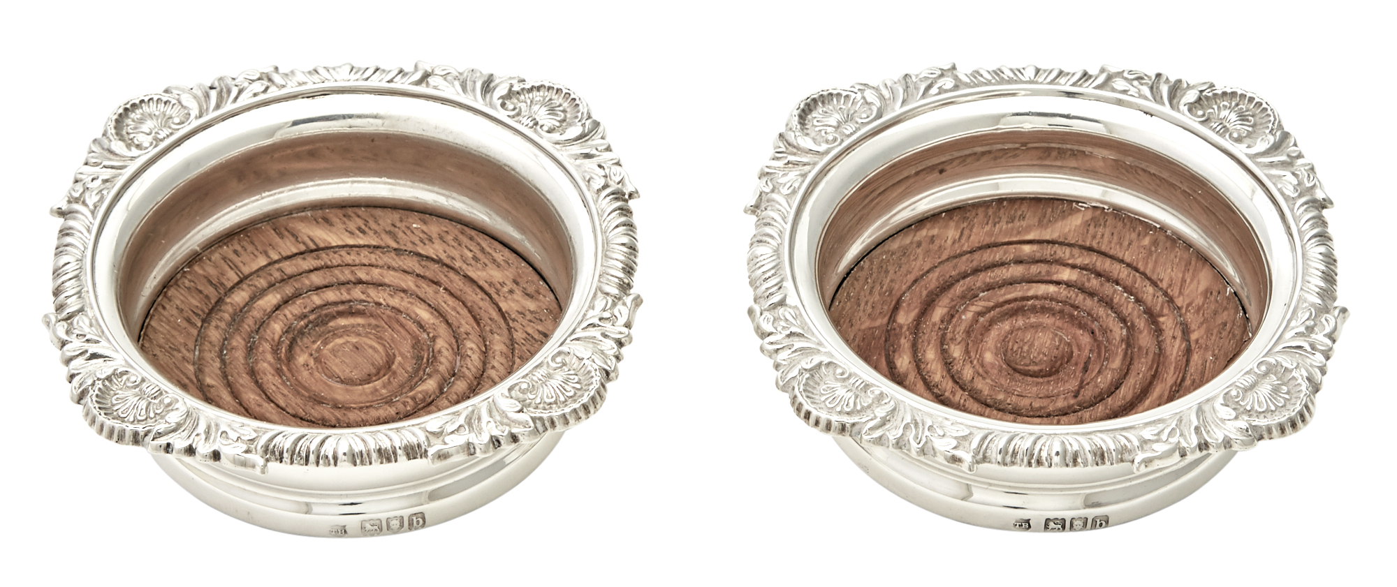 Lot image - Pair of Victorian Sterling Silver Port Bottle Coasters