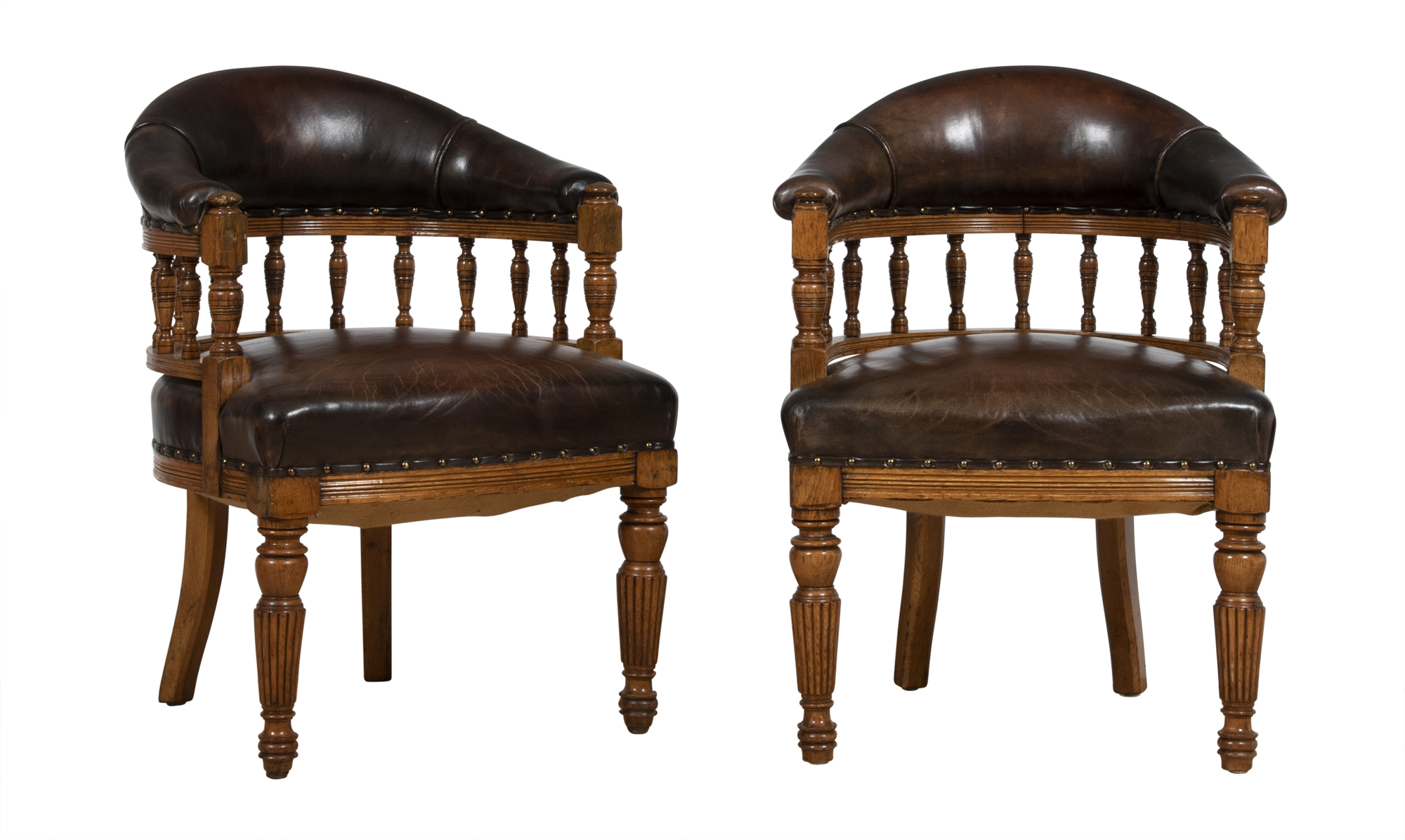 Lot image - Pair of William IV Upholstered Oak Spindle-Back Library Chairs