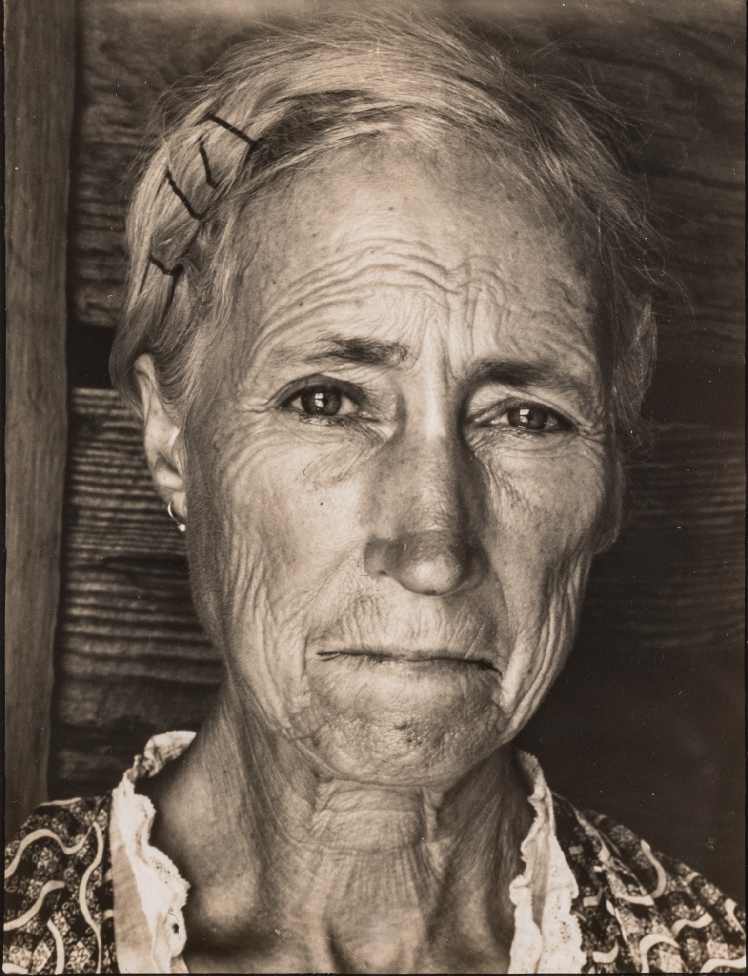 Lot image - BOURKE-WHITE, MARGARET (1904-1971)  [Tenant Farmers Wife, Locket, Georgia],