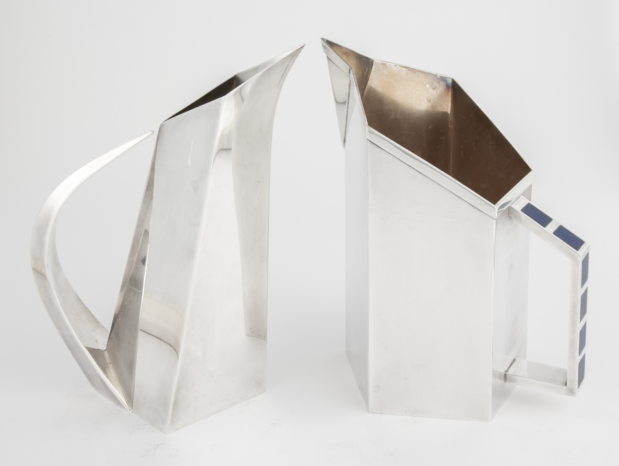 Lot image - Two Italian Modernist Style Sterling Silver Pitchers